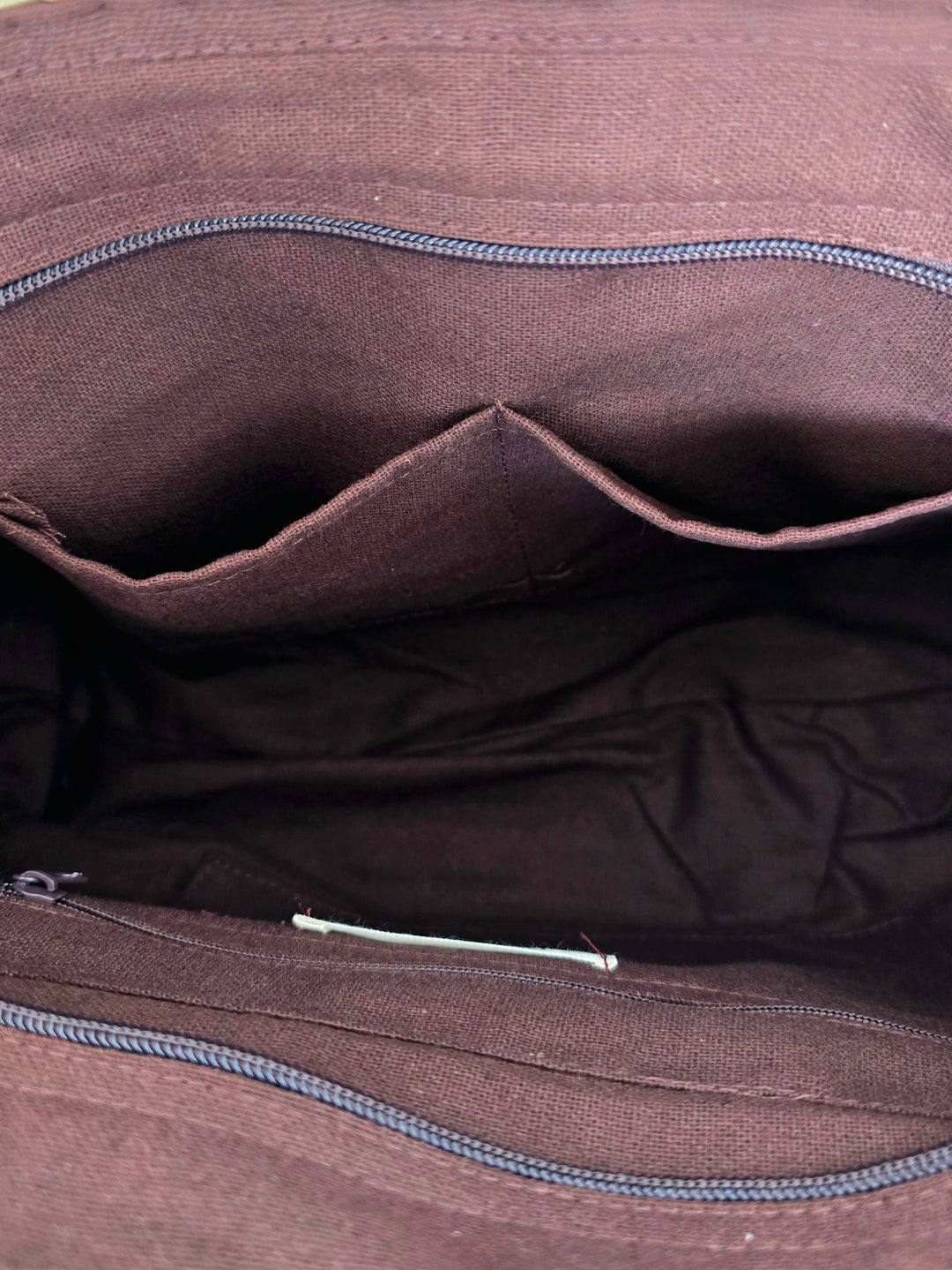 Brown fabric bag with visible stitching details