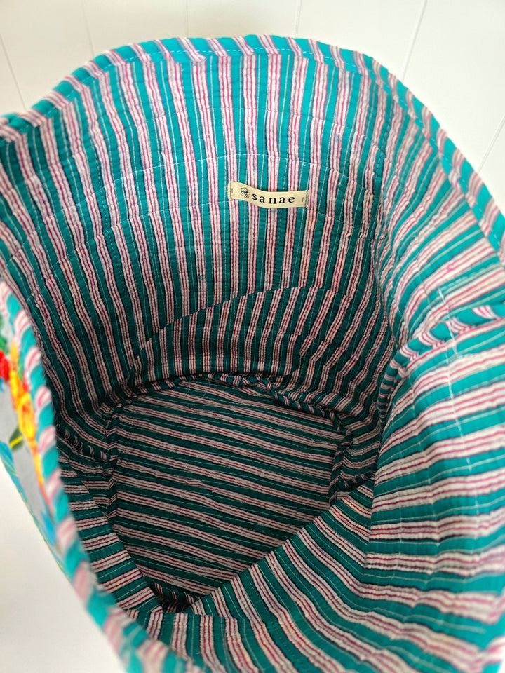 Striped fabric with a brand label on a white background