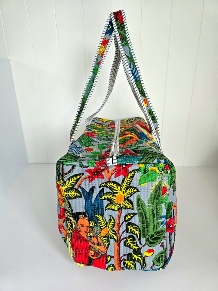 Colorful bag with tropical design on a white background