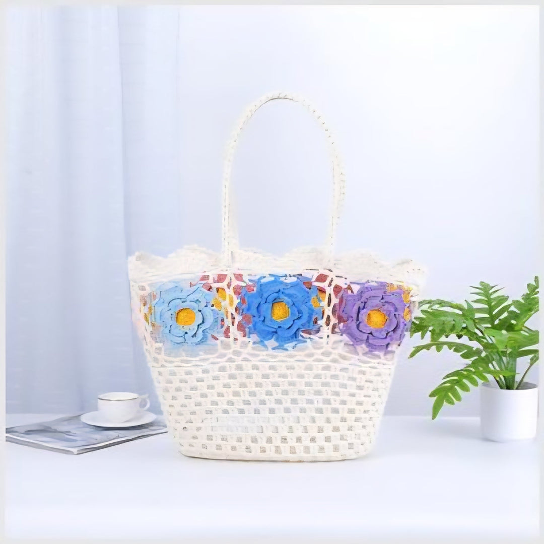 White crocheted beach bag tote with colourful flowers